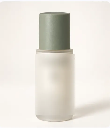 Skincare bottle reference image with the brand label blurred